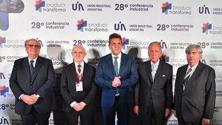 José Ignacio de Mendiguren y Sergio Massa en una conferencia de la UIA.
