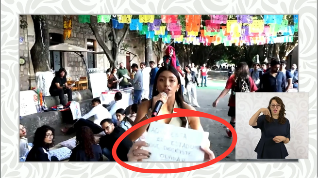 El momento en que aparecieron los carteles opositores en la Mañanera.