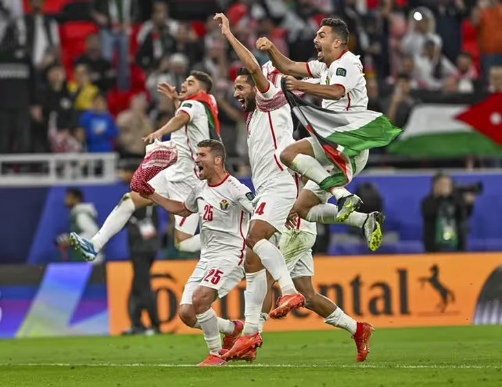 Jordan's players celebrate their historic passage to the final of the Asia Cup. Jordan's players celebrate their historic passage to the final of the Asia Cup.