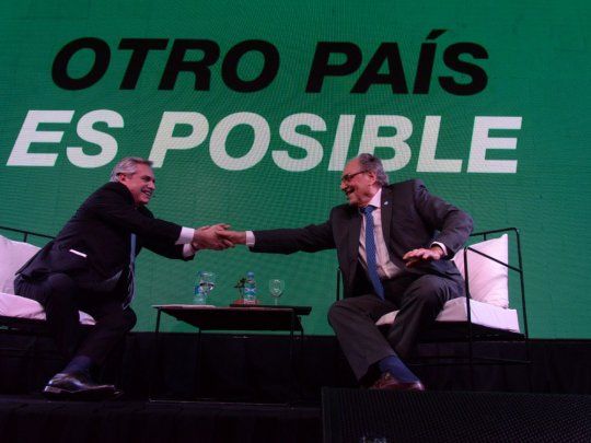 Alberto Fernández y Carlos Heller.