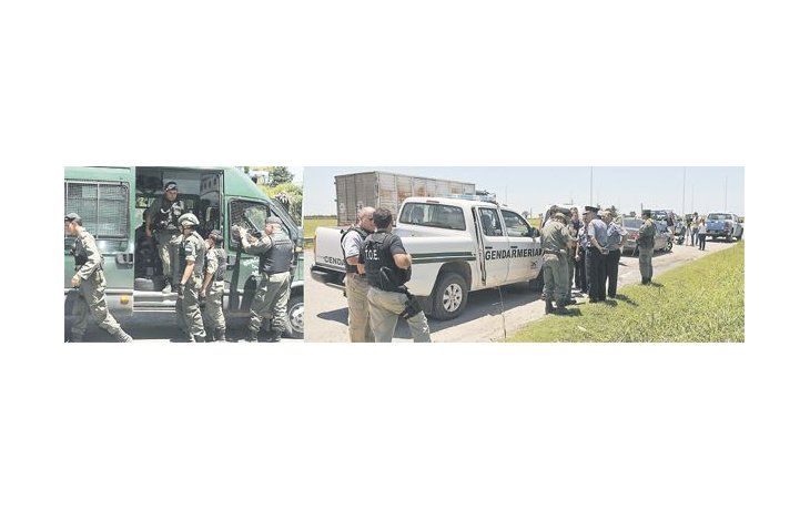 Gendarmes en el hospital Cullen, donde internaron al efectivo herido en el enfrentamiento con los presuntos prófugos, intensamente buscados. Un despliegue de proporciones dispuso el Gobierno ayer en la provincia de Santa Fe para buscar a los tres prófugos tras un enfrentamiento.