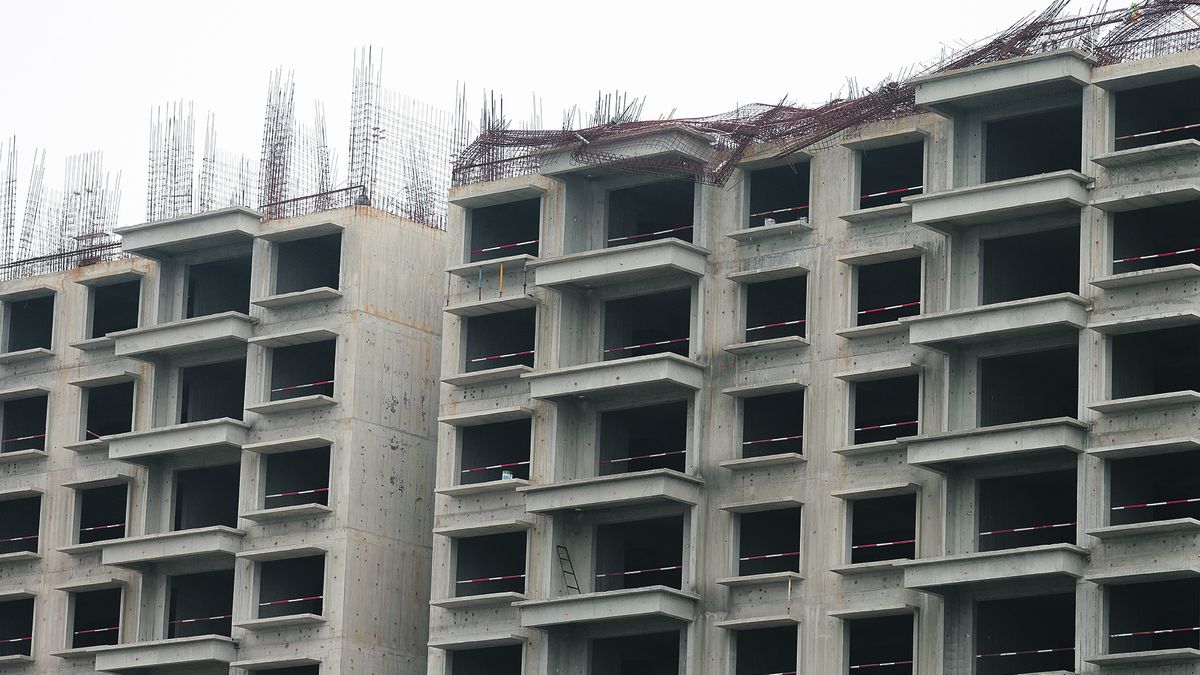 After missing a third maturity of its debt, Evergrande suffers further downgrades