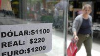 mercados tras fuerte devaluacion: el dolar blue se mantuvo, pero mep subio y ccl bajo; bonos en alza y acciones en rojo