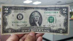 The 2 dollar bill acquired a symbolic value, thus making it a rarity due to the omnipresence of the 1 dollar bill.