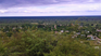A place surrounded by mountains and vegetation A place surrounded by mountains and vegetation