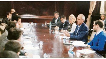 ámbito.com | cara a cara. Caldarelli y Caballero (por la cartera de Interior) y Federico Braun (por Anses), los anfitriones ayer de la reunión con los ministros y subsecretarios de Hacienda de las provincias que no transfirieron su caja.