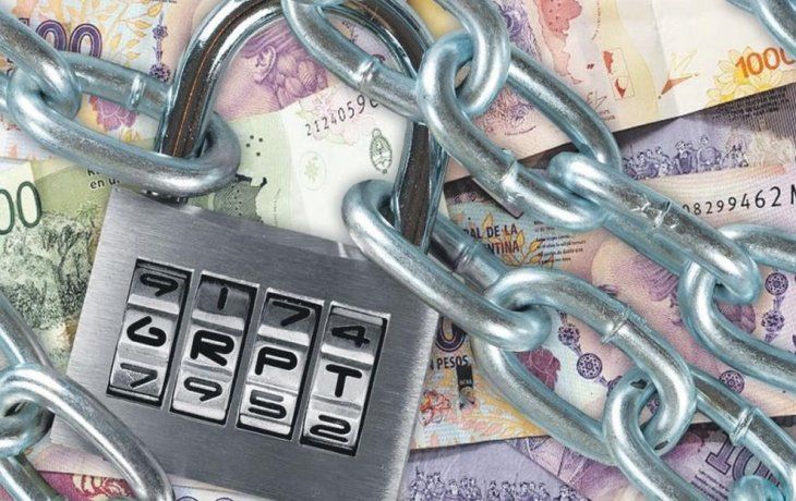 ámbito.com | pesos candado cepo.jpg