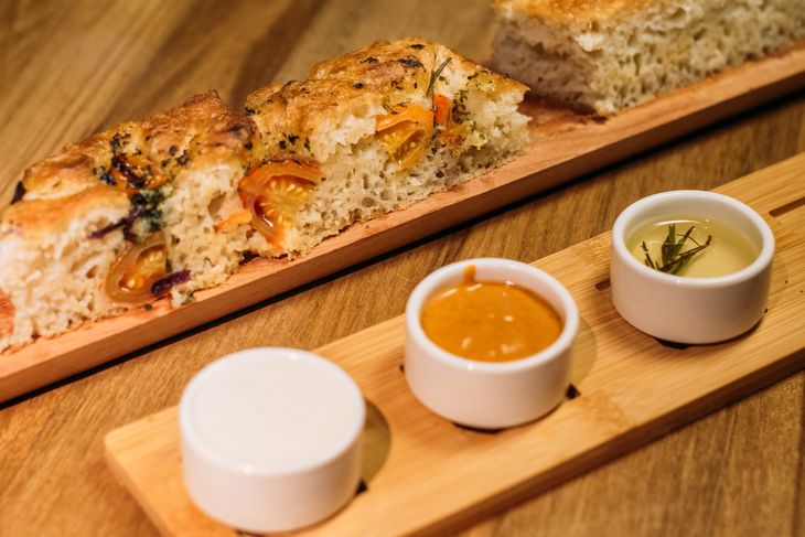 The gastronomic experience begins with a homemade focaccia served with three Dips. The gastronomic experience begins with a homemade focaccia served with three Dips.