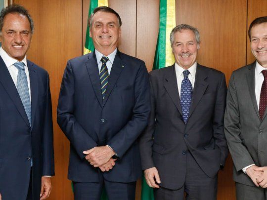 El presidente de Brasil, Jair Bolsonaro junto a la delegación argentina: Daniel Scioli, Felipe Solá y Gustavo Beliz en la reunión bilateral de este miércoles.