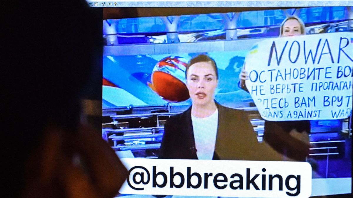 Journalist who protested war fined and faces criminal charges