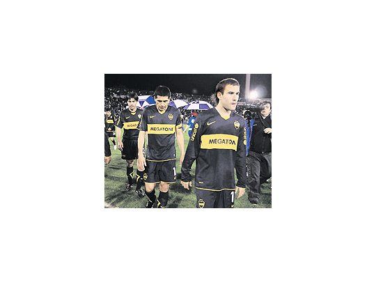 Los rostros de Palacio, Riquelme y Cáceres lo dicen todo. Boca perdió por goleada enMendoza ante Godoy Cruz y se alejó del puntero San Lorenzo.