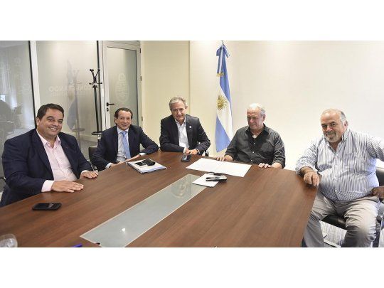 Jorge Triaca, Dante Sica, Andrés Ibarra, Andrés Rodríguez y Héctor Daniel Tristán.