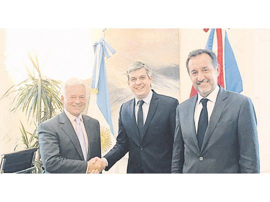 Otro estilo. Alan Duncan, Marcos Peña y Fulvio Pompeo, ayer.