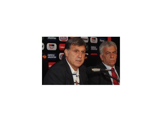 Martino, el flamante DT, y Lorente, presidente del club