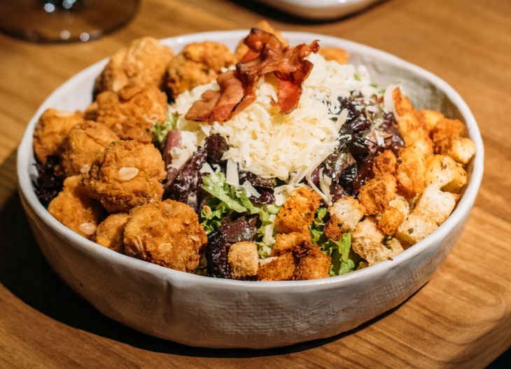 The Crispy breast is offered as a dish or in caesar salad. The Crispy breast is offered as a dish or in caesar salad.