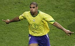 Adriano celebrates the second of his goals against Argentina in the final that saw Brazil win the Confederations Cup 4-1.