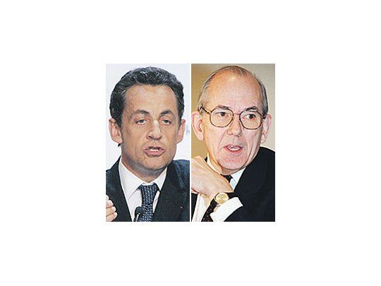 Nicolas Sarkozy y Michel Camdessus