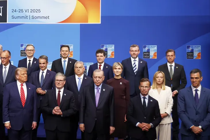 President Donald Trump along with other NATO members. President Donald Trump along with other NATO members.