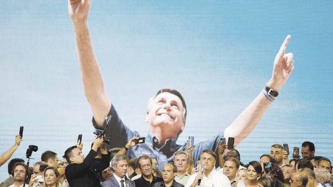 CUENTA REGRESIVA. El presidente Jair Bolsonaro encabezó un acto el fin de semana para oficializar su campaña por la reelección.