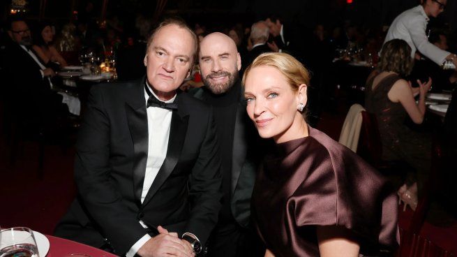 Quentin Tarantino junto a John Travolta y Uma Thurman.&nbsp;