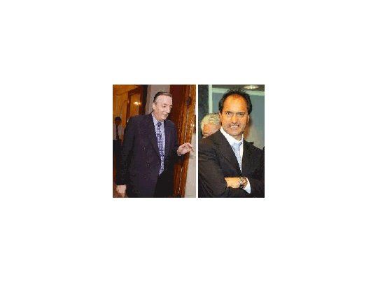 Néstor Kirchner y Daniel Scioli ayer se reunieron en la Casa de Santa Cruz, en la Capital Federal, para definir una respuesta si Carlos Menem formalizaba su renuncia.