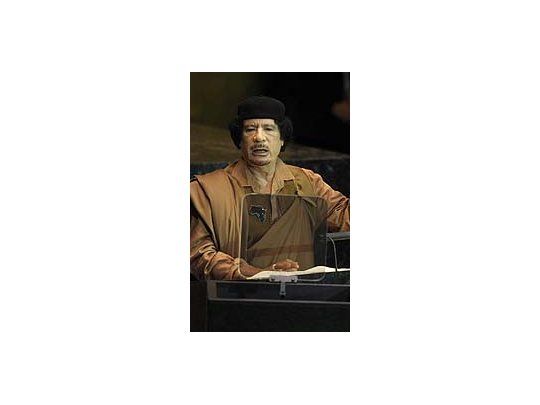 Muamar Gadafi.