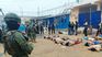 The authorities confirmed the death of 14 inmates and a custodian.
