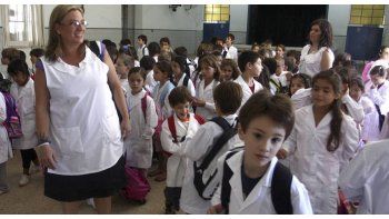 Los chicos podr{an volver a clases tras los comicios.