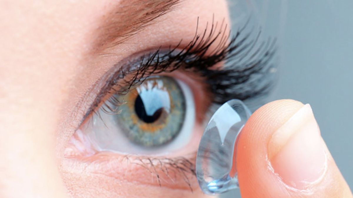 Why do you recommend not getting into the water with contact lenses?