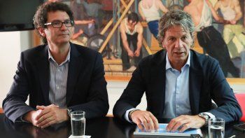 El secretario de Emprendedores y PyMEs, Mariano Mayer, junto al superintendente de Seguros de la Nación, Juan Pazo.