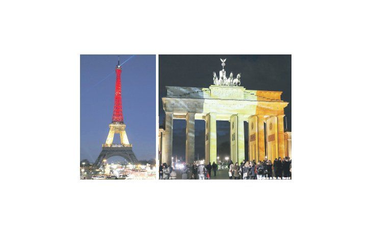 ámbito.com | La Torre Eiffel y la Puerta de Brandenburgo “se vistieron” anoche con los colores de la bandera belga,a modo de solidaridad y homenaje a las víctimas de los atentados de Bruselas.