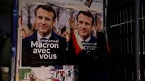 Afiches del presidente y candidato a la reelección en Francia, Emmanuel Macron.