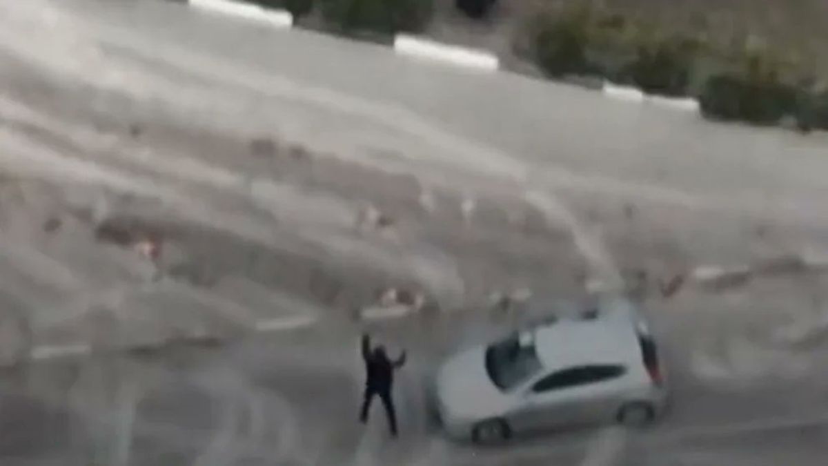 a drone captured the moment when russian soldiers killed a ukrainian civilian