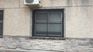 La ventana por donde logró escapar la mujer de Haroldi Conti con dos de sus hijos.