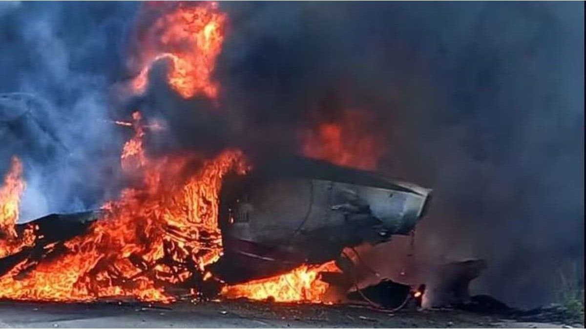 images of the shocking moment in which a small plane catches fire and crashes