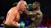 tyson fury y deontay wilder chocan por el titulo de los pesados
