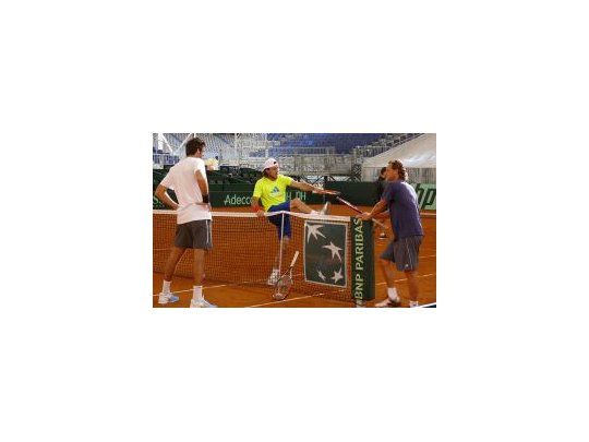 Del Potro, Mónaco y Nalbandian entrenando en el estadio La Cartuja.