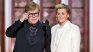 Elton John y Brandi Carlile durante la entrega de los Globos de Oro. 