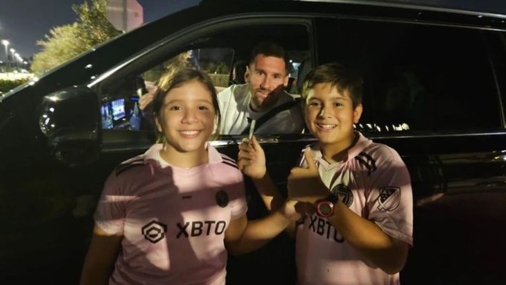 The photo of the two children with Lionel Messi. The photo of the two children with Lionel Messi.