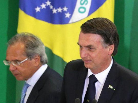 Bolsonaro, junto al ministro Guedes.