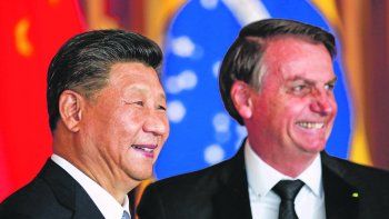 Encuentro. Xi Jimping y Bolsonaro, ayer, en Brasilia, en el marco de la cumbre del BRICS.