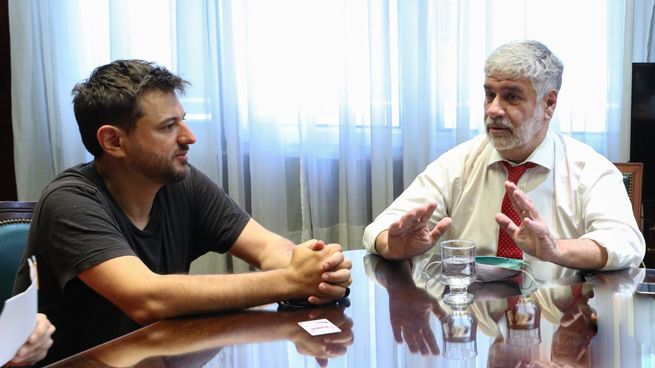 Juan Grabois y Roberto Feletti.