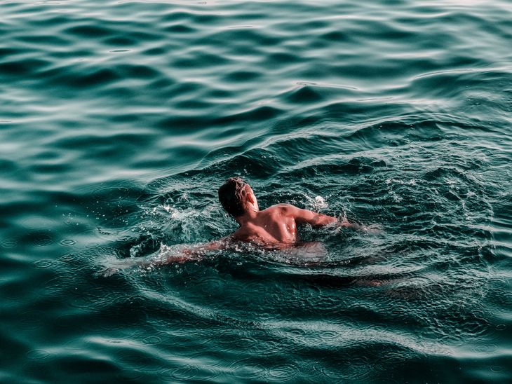 Swimming in open water. Swimming in open water.