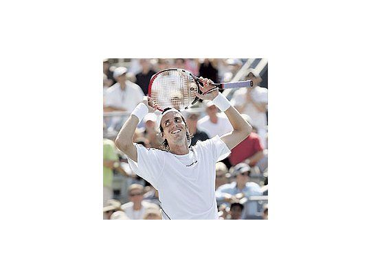 Otro festejo de Juan Ignacio Chela. Ayer avanzó a los cuartosde final del Abierto de los Estados Unidos.