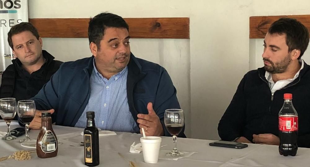 Alex Campbell, Jorge Triaca y Ezequiel Pazos.