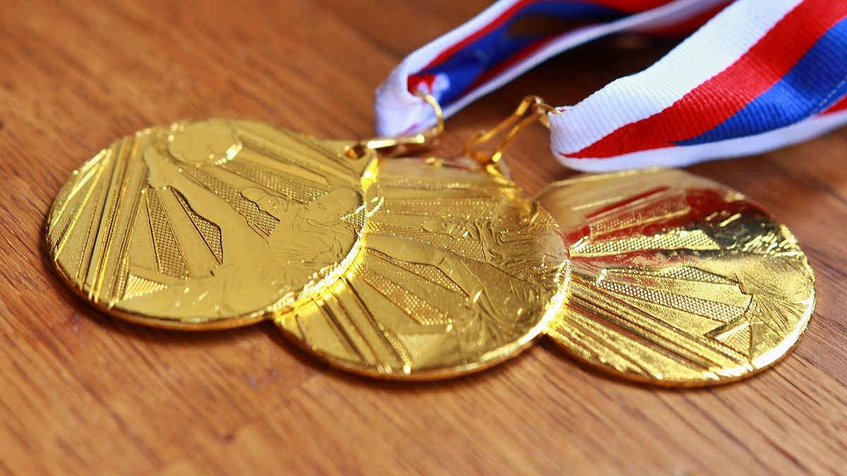 Who was she and in what discipline did a woman win gold for the first time at the Olympic Games? Who was she and in what discipline did a woman win gold for the first time at the Olympic Games?