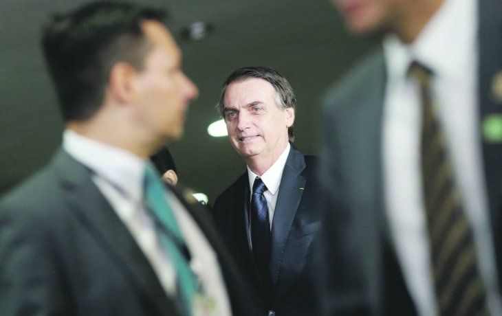 VENTANA. Jair Bolsonaro presentó su reforma estrella en medio de la convulsión política generada a partir de las denuncias de corrupción contra quien fuera su secretario de Presidencia, Gustavo Bebbiano.