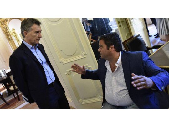 El presidente Mauricio Macri junto al ministro de Trabajo Jorge Triaca.
