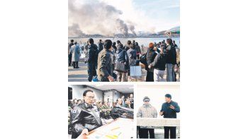 Arriba, turistas de Corea del Sur muestran el humo que emana tras el impacto de misiles en la isla de Yeonpyeong. El desafiante dictador de Pyongyang, Kim Jong Il, se dejó ver el lunes en un criadero de peces. Ayer, el presidente de Surcorea visitó el Comando Conjunto del Ministerio de Defensa, en Seúl.