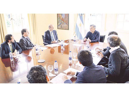 Explicaciones. Mauricio Macri abrió ayer Olivos para escuchar la versión del directorio del BCRA sobre la inflación y el sistema financiero.